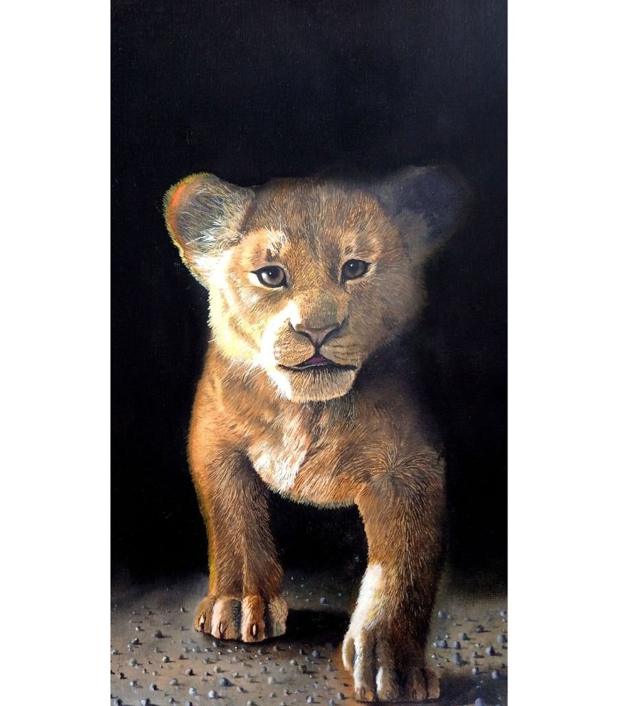 Lion 12x18 inch hyper-realistic oil painting of a lion cub on a black background by The Indobrit Arts, showing detailed fur and expressive eyes.