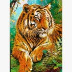 A detailed tiger portrait created with intricate thread art techniques by Ms. Praveena, featuring 35 distinct shades of thread on a 32x22 inch canvas.