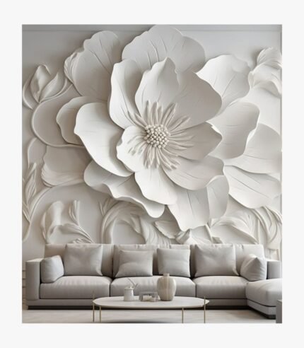 A large, 48x60-inch hand-carved plaster wall sculpture titled Ethereal Bloom A large, 48x60-inch hand-carved plaster wall sculpture titled Ethereal Bloom featuring a high-relief white floral design above a modern sofa.