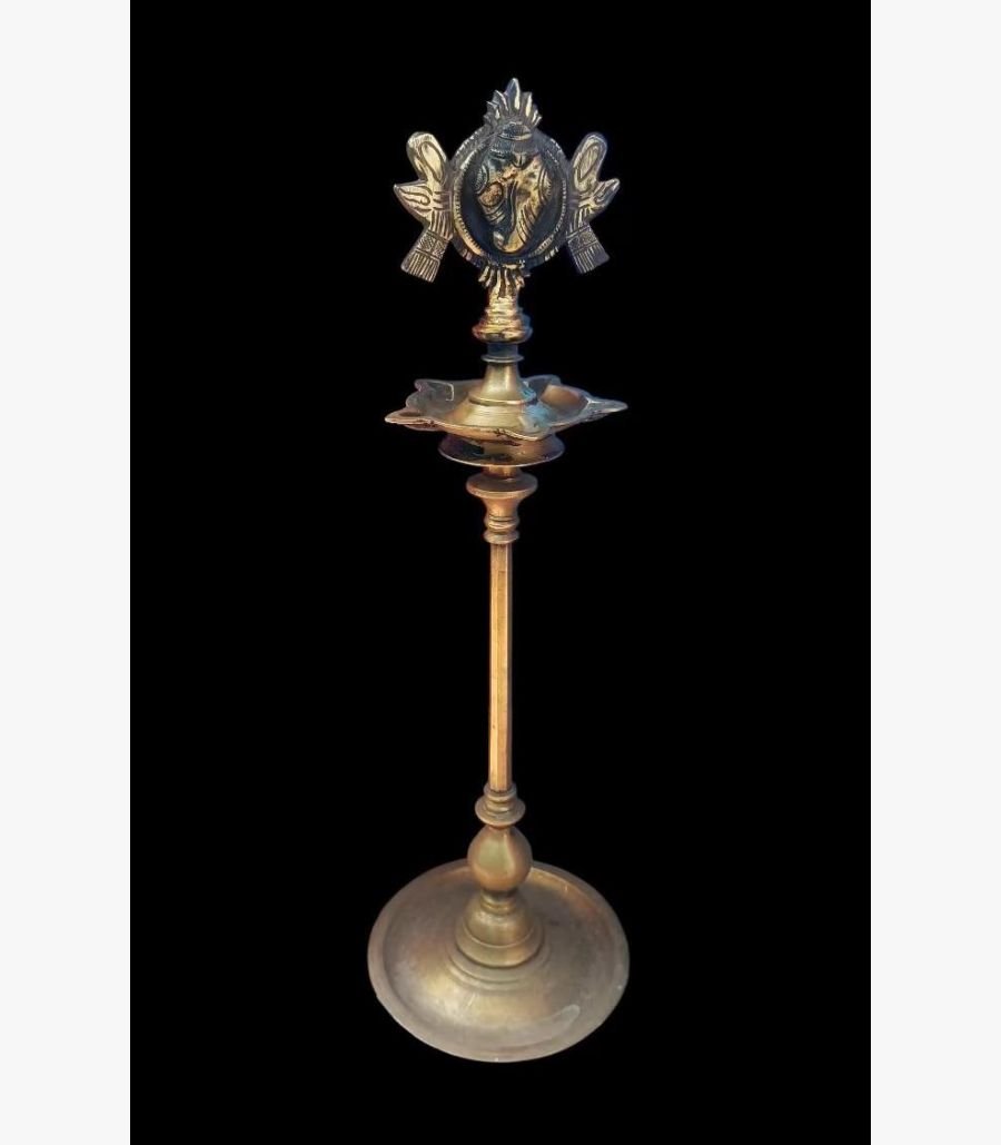 Imperial Feather and Rudraksha Brass Ritual Bell A high-end handcrafted brass ritual pooja bell featuring an intricate feather-shaped handle and a genuine Rudraksha bead in a red velvet gift box.