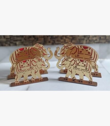 A set of two elegant gold-tone acrylic elephant figurines featuring intricate red detailing, standing on rectangular bases.