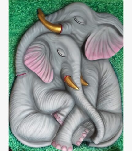 An original sculpted wall piece titled 'Tranquil Companions' featuring two grey elephants resting together on a textured green background.