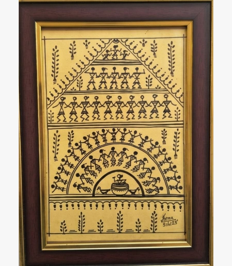 Warli Tribal Celebration by Kena Anshuman A detailed Warli tribal painting by Kena Anshuman featuring tiered rows of dancers and musicians in black marker on a golden-yellow background.