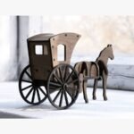 A minimalist walnut-toned wooden horse and carriage sculpture featuring clean lines and architectural precision.