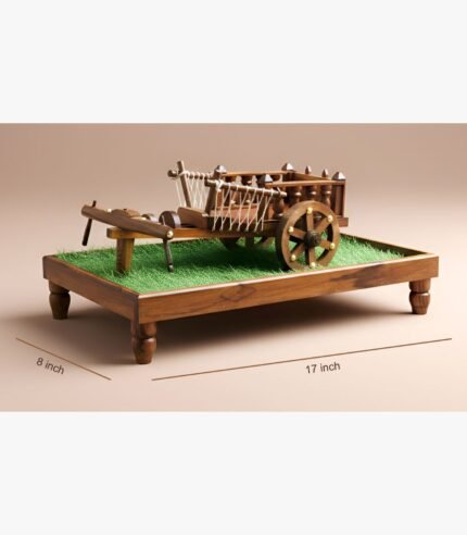 A grand 17-inch handcrafted wooden bullock cart and plough miniature on a turf-lined display pedestal with polished brass details.