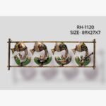 Contemporary handmade metal wall art panel featuring four musical Ganesha figures playing instruments within a rectangular frame.