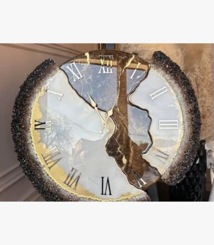 Luxury circular geode epoxy resin wall clock titled Gilded Geode Splendor by Vina Bhavsar featuring a fractured gemstone design with white, brown, and gold veins, silver Roman numerals, and textured crushed crystal borders.