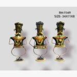 Handcrafted three-piece Rajasthani tribal musicians iron sculpture set featuring hand-painted traditional male folk figures with looped wire legs on round base plinths.