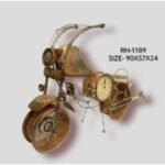 Handcrafted large wrought iron vintage cruiser motorcycle sculpture desk clock titled Royal Chopper by Crafts Heritage featuring a textured brass-bronze body adorned with high-handle bars, traditional hand-painted lacquer motifs, and a built-in analog clock dial.