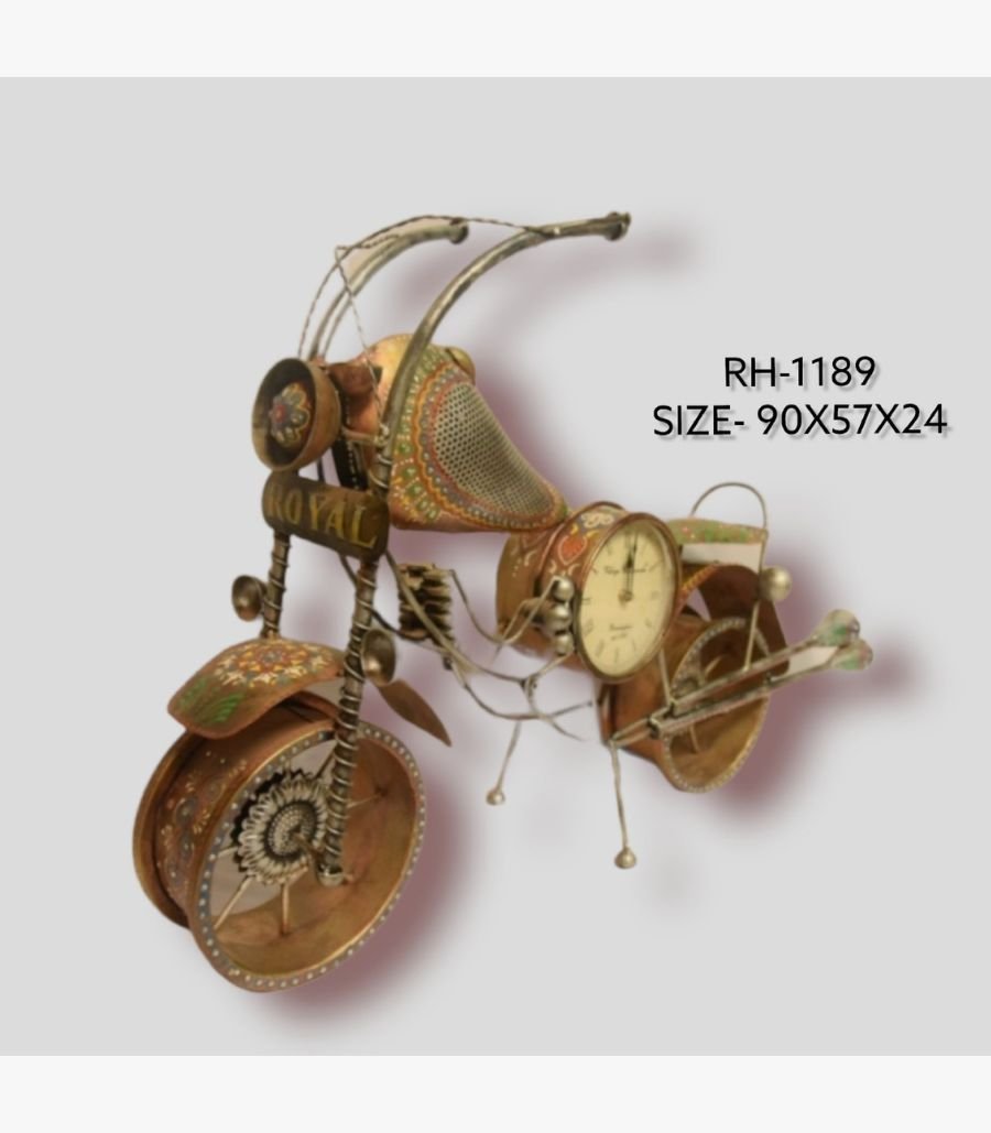 12 Handcrafted large wrought iron vintage cruiser motorcycle sculpture desk clock titled Royal Chopper by Crafts Heritage featuring a textured brass-bronze body adorned with high-handle bars, traditional hand-painted lacquer motifs, and a built-in analog clock dial.