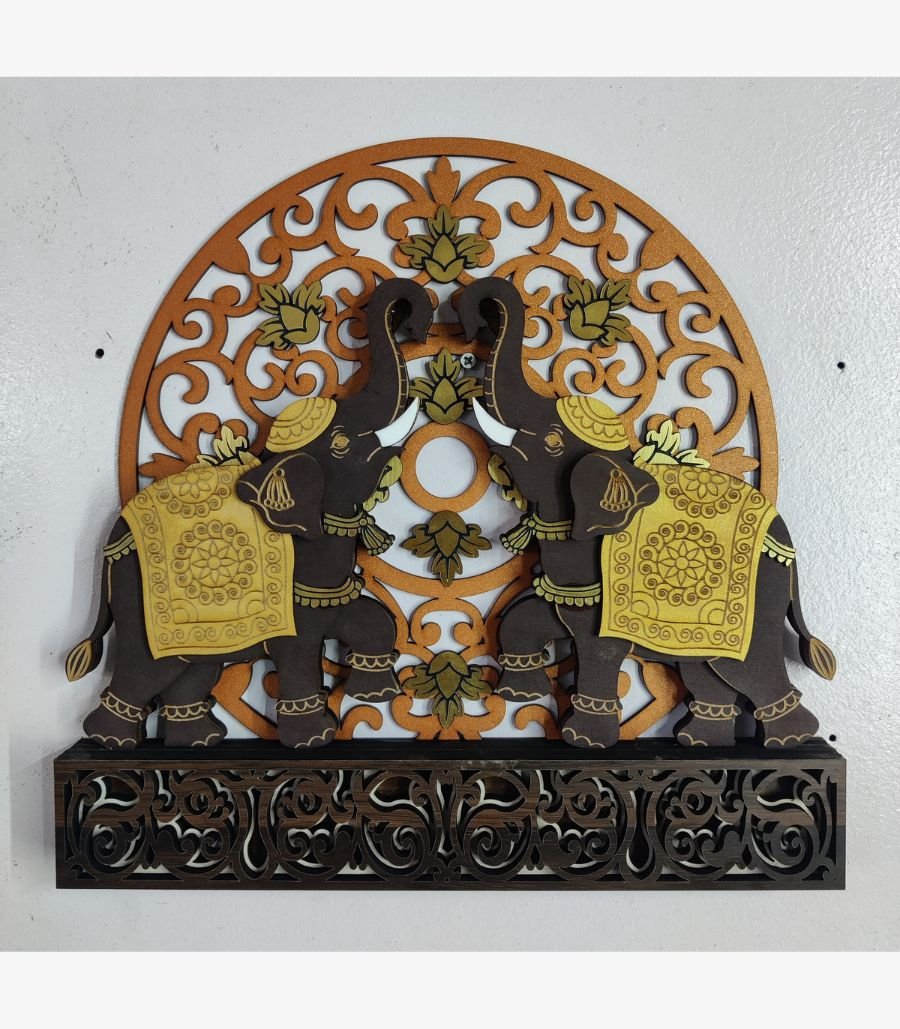 13 Handcrafted 3D layered wooden elephant wall sculpture titled Royal Gaja Resonance featuring two caparisoned royal elephants with raised trunks on an intricate geometric filigree backdrop frame.