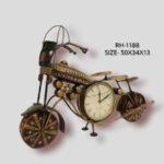 Handcrafted medium wrought iron classic cruiser motorcycle sculpture desk clock titled Highway Monarch by Crafts Heritage featuring a textured bronze frame adorned with traditional hand-painted lacquer details and an integrated analog clock dial.