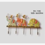 Handcrafted wrought iron decorative wall hanger with 5 hooks titled Imperial Procession by Crafts Heritage featuring three vibrant blue, red, and green hand-painted elephants marching below a golden leafy vine.