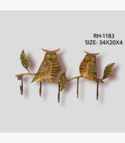 Handcrafted wrought iron decorative wall hanger with 5 hooks titled Nocturnal Guardians by Crafts Heritage featuring two vibrant hand-painted owls with folk lacquer motifs perched on a textured leafy branch.
