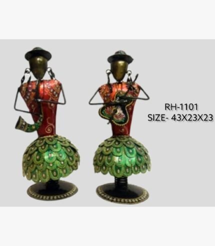 Handcrafted tribal musicians duo metal sculpture set featuring two stylized iron figures in green peacock pattern skirts playing a horn and string instrument.
