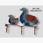Handcrafted hand-painted iron wall hook featuring a blue duck and duckling perched on a branch with three utility hangers.