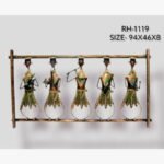 Handcrafted tribal musicians metal wall art frame featuring five stylized figures playing traditional folk instruments.