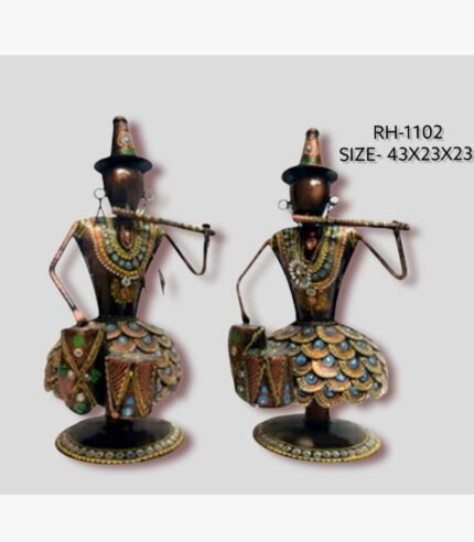 Handcrafted tribal musicians duo metal sculpture set featuring two stylized iron figures in copper tones and colorful textured skirts playing the flute and drum.