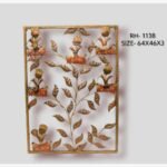 Handcrafted tribal musicians tree of life metal wall art featuring six folk figures playing instruments amidst patterned iron leaves inside a rectangular frame.