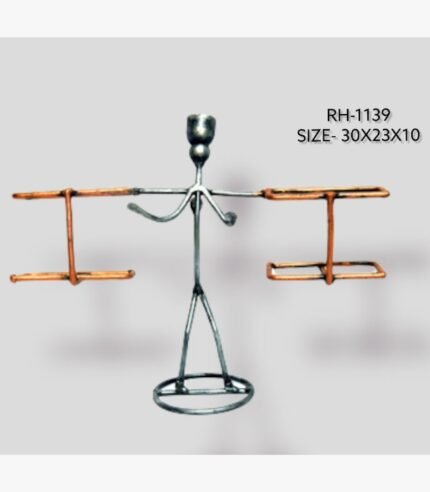 Handcrafted tribal man balancing baskets metal sculpture featuring a minimalist stick figure design with copper-toned rectangular frames on a circular base.