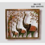 Handcrafted royal elephant family tree of life metal wall art panel featuring three hand-painted iron elephants with trunks up beneath a textured tree inside a square frame.