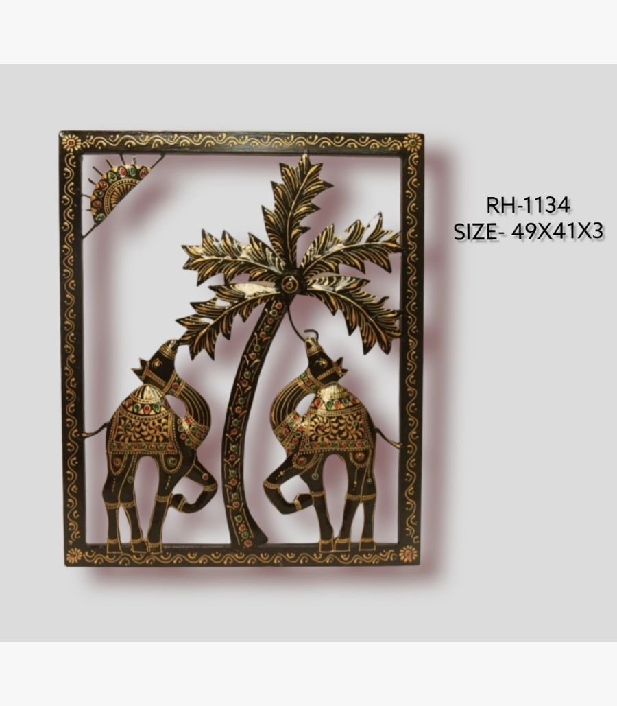 27 Handcrafted desert camels and palm tree metal wall art panel featuring two traditional painted iron camels under a golden sun and palm fronds in a rectangular frame.