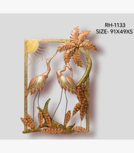 Handcrafted tropical cranes and palm tree metal wall art panel featuring two hand-painted iron crane birds standing near a patterned palm tree and sun motif inside a rectangular golden frame.