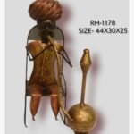 Handcrafted Rajasthani village elder hookah smoker iron sculpture featuring a detailed turban, patterned traditional attire, and a large gold-toned hubble-bubble pipe on a high-back chair.