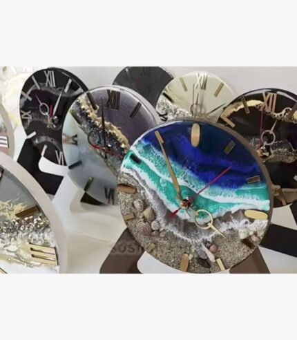Handcrafted circular ocean wave epoxy resin clock titled Ocean Surge by Vina Bhavsar featuring realistic layered sea foam, deep blue water gradients, and a sandy beach shoreline with real seashells.