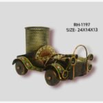 Handcrafted wrought iron vintage classic car pen stand titled Vintage Cruise by Crafts Heritage featuring a rustic bronze body with vibrant green, red, and yellow traditional lacquer detailing and an integrated mesh storage cylinder.