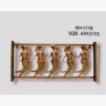 Handcrafted tribal women dancers metal wall art panel featuring five stylized dancing figures with traditional patterns in an iron frame.