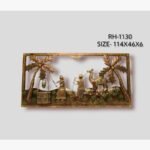 Handcrafted Rajasthani village well and camel caravan metal wall art panel featuring traditional figures drawing water, a decorated camel, and palm trees within an embossed copper frame.
