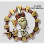 Handcrafted divine Lord Ganesha metal wall art sculpture featuring a textured white metal Ganpati face holding Lord Krishna flute inside a circular copper and gold gear frame.