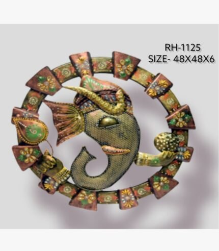 Handcrafted circular Lord Ganesha metal wall art panel featuring a textured iron Ganpati face holding a laddu modak and a green leaf within an ornate painted frame.