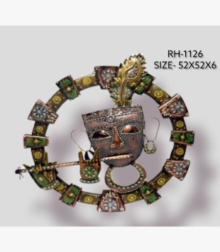 Handcrafted circular Shrinathji Krishna metal wall art sculpture featuring a textured metallic face, ornate peacock feather, and hands playing a flute within a hand-painted floral ring.