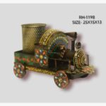 Handcrafted wrought iron vintage steam engine train pen stand titled Majestic Locomotive by Crafts Heritage featuring a textured dark bronze finish with vibrant hand-painted floral patterns and an integrated mesh storage basket.