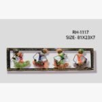 Handcrafted colorful tribal musicians metal wall art panel featuring four seated figures playing folk instruments inside a decorative border frame.