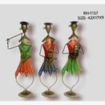 Handcrafted three-piece tall Rajasthani folk musicians iron sculpture set featuring hand-painted traditional attire, instruments, and curved leg wire loops on round base plinths.