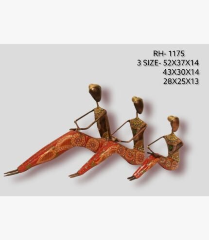 Handcrafted three-piece Rajasthani relaxing tribal figures iron sculpture set featuring hand-painted red patterned outstretched legs and metallic bronze bodices.