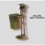 Handcrafted wrought iron ironmongery stick figure man wearing a traditional wide-brimmed hat holding a brass-gold metallic perforated pen organizer cylinder cup.