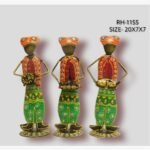Handcrafted three-piece mini Rajasthani folk musicians iron statue set featuring hand-painted traditional waistcoats and musical instruments on round base plinths.