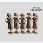 Handcrafted five-piece Rajasthani tribal women musicians iron sculpture set featuring hand-painted black traditional dresses with gold motifs on circular base plinths.