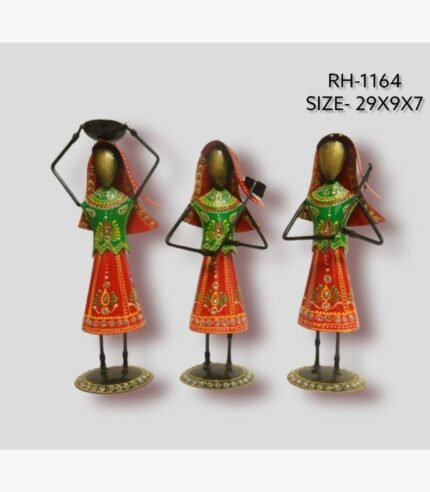 Handcrafted three-piece Rajasthani women performing daily chores iron sculpture set featuring hand-painted red ghagras and green cholis on round pedestal bases.