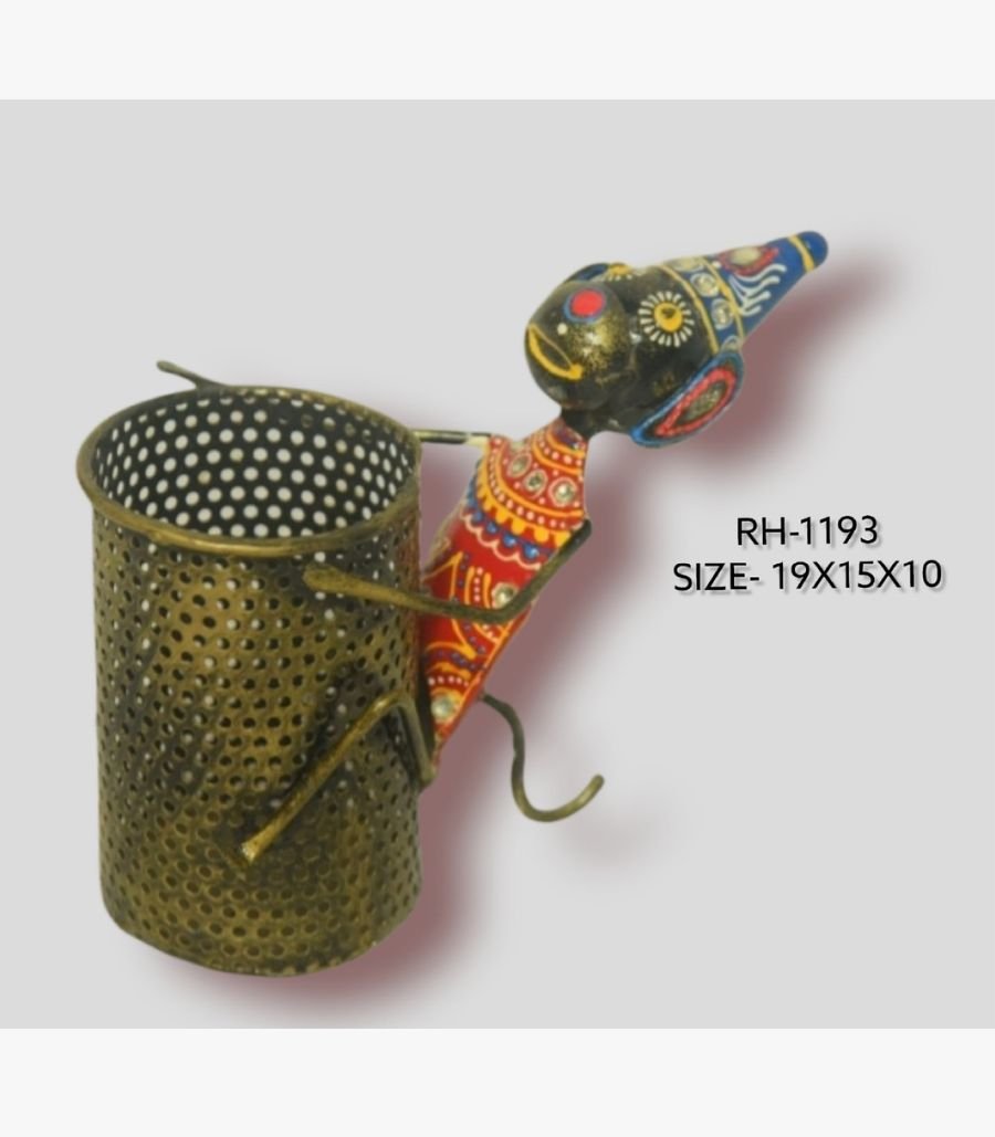 8 Handcrafted wrought iron traditional Indian monkey pen stand titled Playful Monkey by Crafts Heritage featuring a black painted head with a blue conical hat and red patterned body climbing a brass-gold metallic perforated storage cylinder.