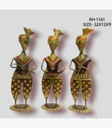Handcrafted three-piece Rajasthani musicians iron sculpture set featuring hand-painted floral harem pants, colorful turbans, and traditional folk instruments on flat oval bases.
