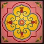 Handcrafted 3D layered wooden mandala tile plaque titled Vintage Floral Emblem featuring a symmetrical yellow quatrefoil, light blue scrollwork, and crimson accents on a pastel pink background panel.