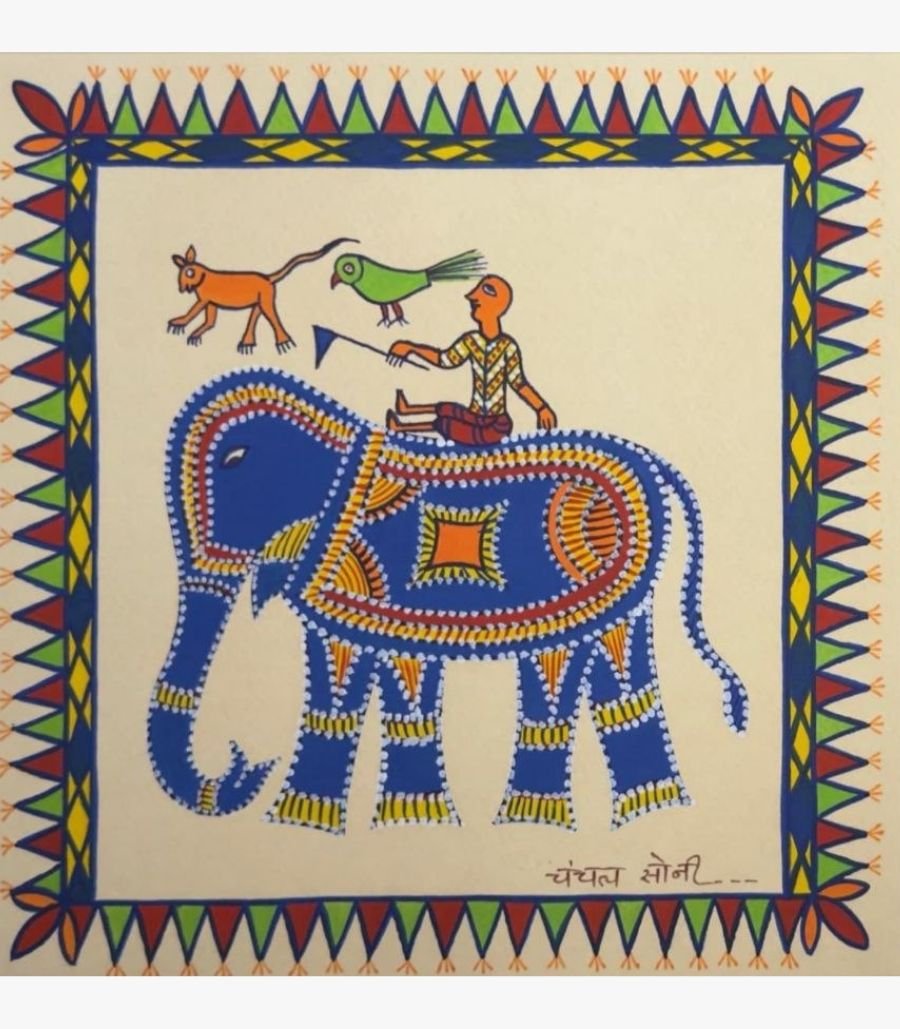 Chanchal Soni - The Indigo March - Acrylic on Paper Traditional Indian tribal folk art painting by Chanchal Soni featuring a mahout riding a decorated blue elephant alongside a green parrot and a small orange animal, hand-painted in acrylic on paper.