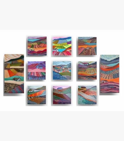 A stunning 11-panel modern abstract landscape art installation featuring a 3x3 square grid flanked by two vertical panels showing vibrant, patterned rolling hills and cottages by Vikas Shiyal.