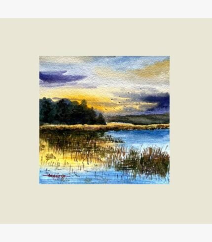 An original impressionistic watercolor landscape painting on paper depicting a peaceful lake at sunset with golden marsh reeds, flying birds, and soft dusk clouds by artist Avinash.