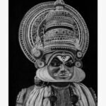 Highly detailed monochrome charcoal and graphite sketch titled Kathakali (Divine Expression) by Bharti Parmar depicting a traditional Kathakali dancer with an elaborate headgear and expressive facial makeup.